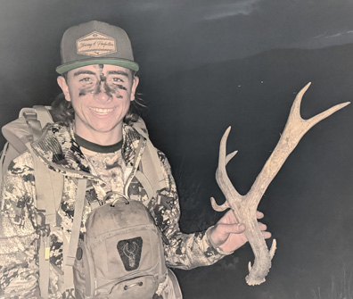 Hiking back to pack out turkeys, Carson found this unique shed non-typical deer antler shed
