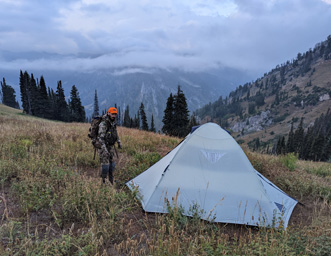 Slope of tent felt worse than it looks pitched tent sloping mountainside