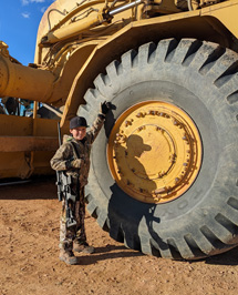 Huge heavy equipment working gas/oil fields huge tractor tire