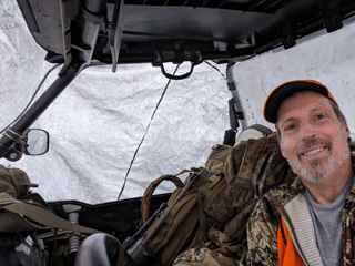 RZR cover kept me dry from the deluge i went hunting deer hunt rain