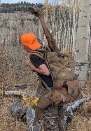 Took all day, packing out last load at 6:00 p.m. packing out elk, hind quarter