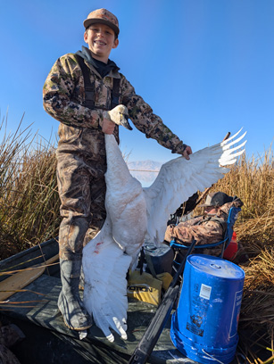 Daxton with first swan! swan hunting i went hunting