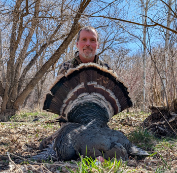 Chalked up another with the 12 gauge tail fan turkey