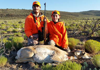 The boys with Carson's first big game animal first big game animal