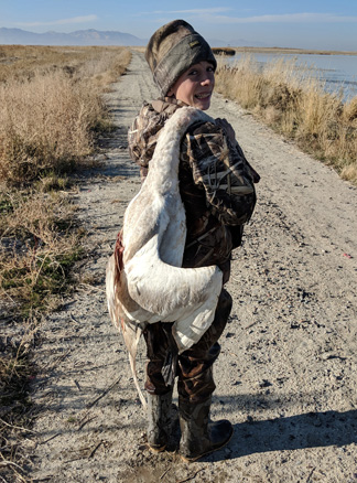 Carson with his swan! tundra swan